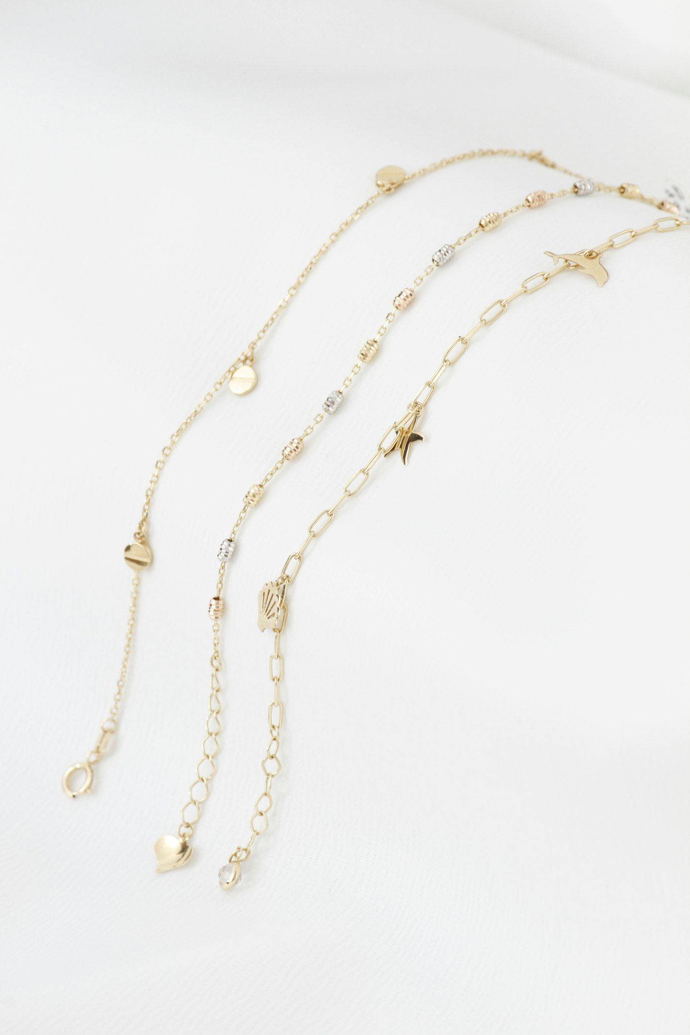 Charm Bracelets, gold-plated surgical stainless steel (acero quirúrgico)